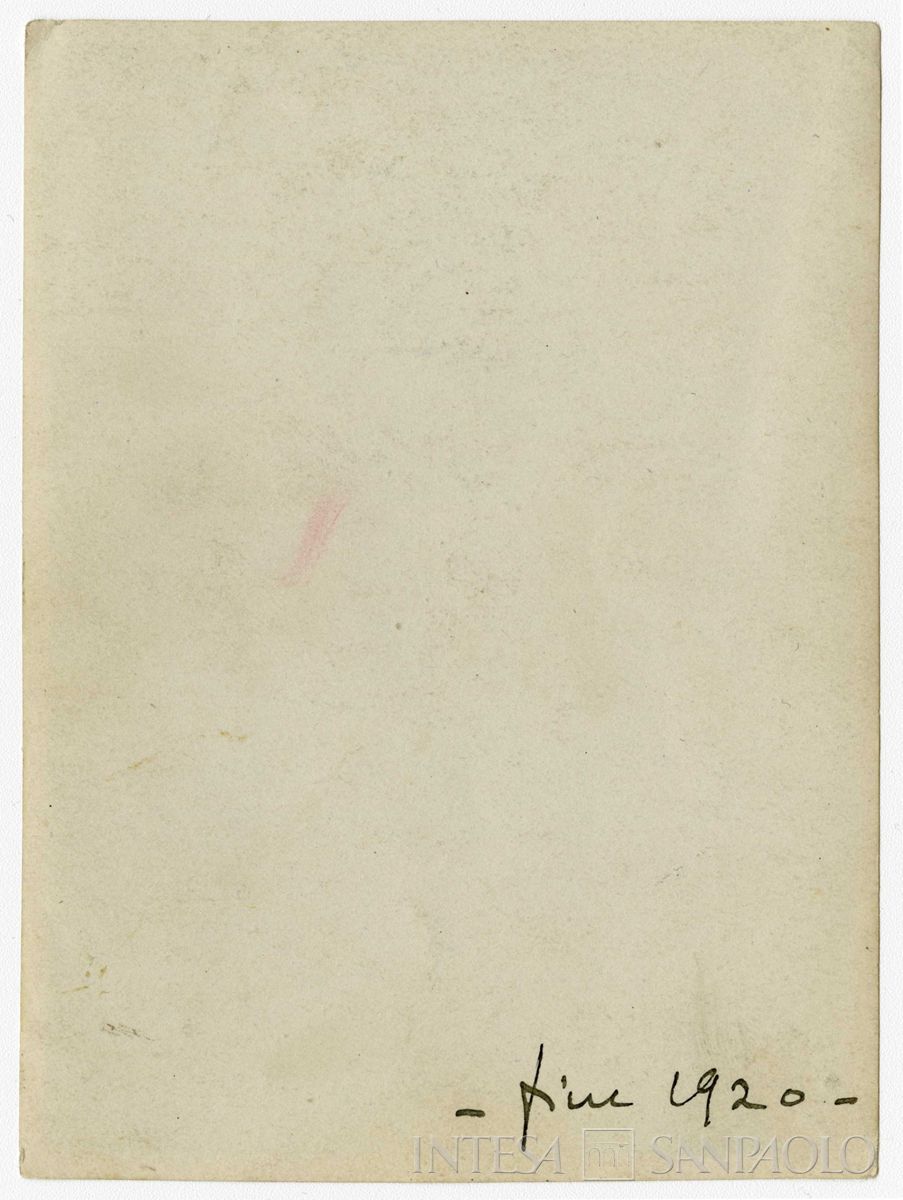 Raffaele Mattioli, capo redattore della "Rivista Bancaria", nella stanza prestata all'Associazione Bancaria Italiana dall'Università Bocconi, in via Statuto, fine 1920 (fotografo sconosciuto) (verso)