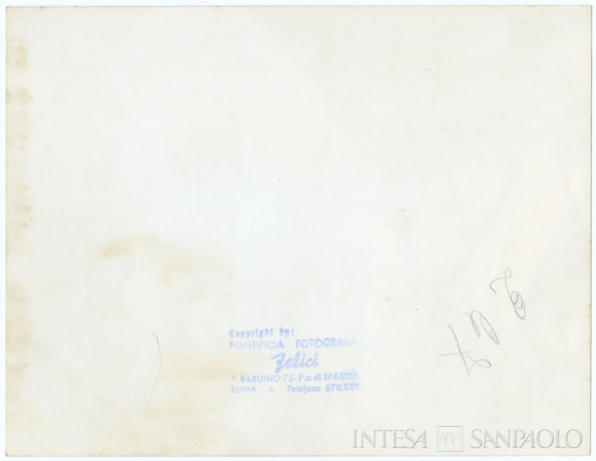 Raffaele Mattioli partecipa all'inaugurazione della Porta della Morte nella Basilica di San Pietro, Roma, 28 giugno 1964 (fotografo Bruno Del Priore) (verso)