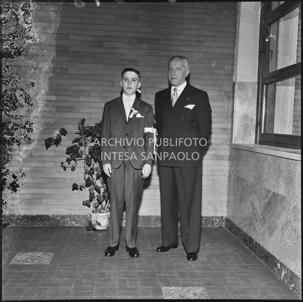 Un bambino dell'Istituto Leone XIII di Milano con un uomo in occasione della celebrazione del sacramento della Cresima<br>216898