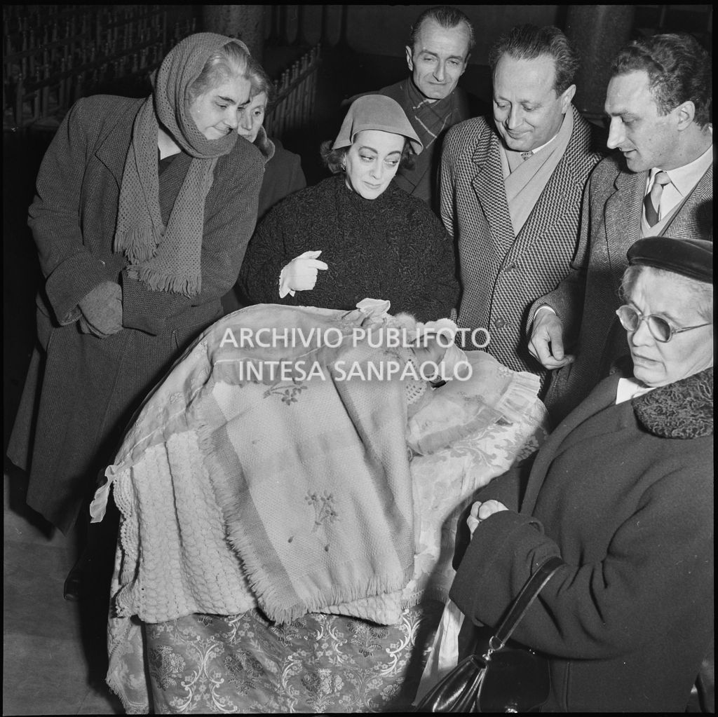 Un momento della celebrazione del battesimo della nipote di Dino Villani in una chiesa di Milano<br>240379